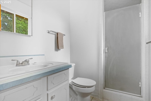 744 NE Craig St, Myrtle Creek, OR 97457 - bathroom featuring vanity, a shower stall, and toilet