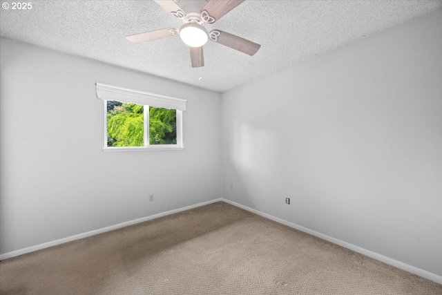 744 NE Craig St, Myrtle Creek, OR 97457 - spare room with carpet flooring, a textured ceiling, baseboards, and ceiling fan