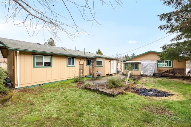 744 NE Craig St, Myrtle Creek, OR 97457 - rear view of house featuring a patio and a lawn