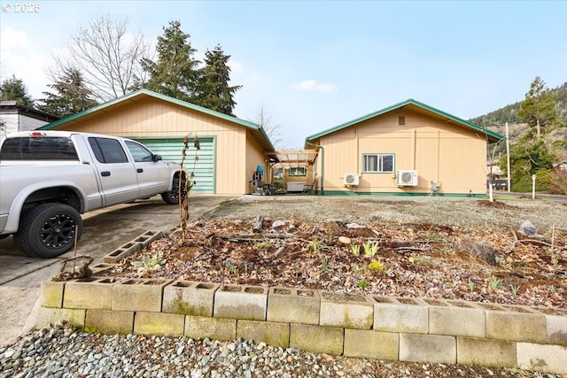 744 NE Craig St, Myrtle Creek, OR 97457 - view of side of property featuring concrete driveway