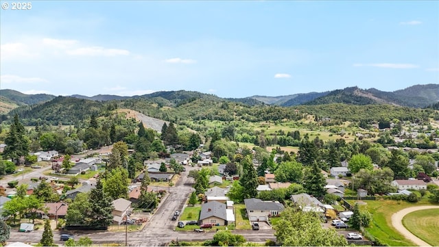 744 NE Craig St, Myrtle Creek, OR 97457 - aerial view of residential area featuring mountains