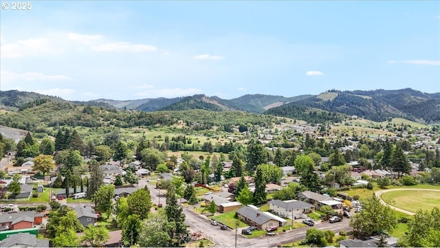 744 NE Craig St, Myrtle Creek, OR 97457 - aerial perspective of suburban area with mountains