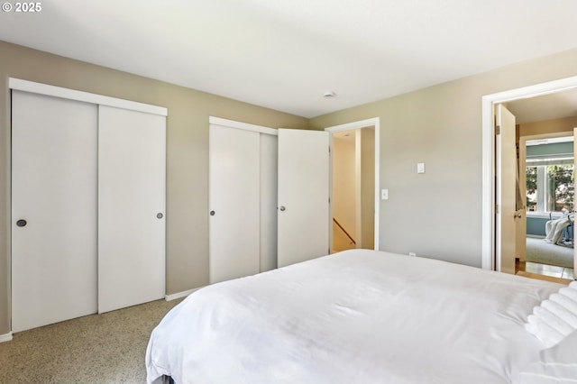 bedroom featuring two closets