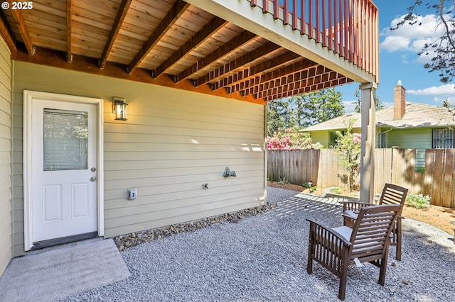 view of patio / terrace featuring fence