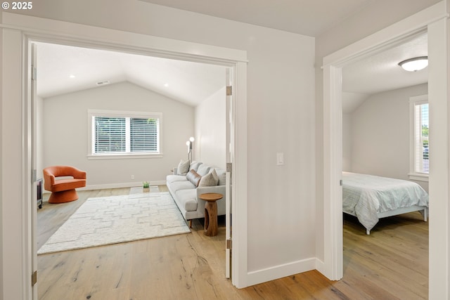 1408 Taylor St, Eugene, OR 97402 - bedroom featuring vaulted ceiling, baseboards, and wood finished floors