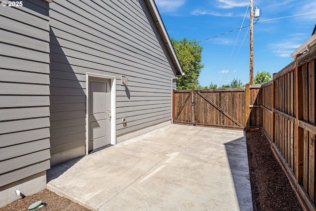 1408 Taylor St, Eugene, OR 97402 - fenced backyard featuring a patio area