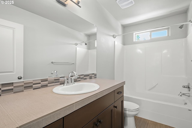 15519 NE 108th Way, Vancouver, WA 98682 - full bath featuring decorative backsplash, bathing tub / shower combination, vanity, and toilet