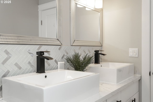 3817 NE 11th Ave, Portland, OR 97212 - bathroom with double vanity and backsplash