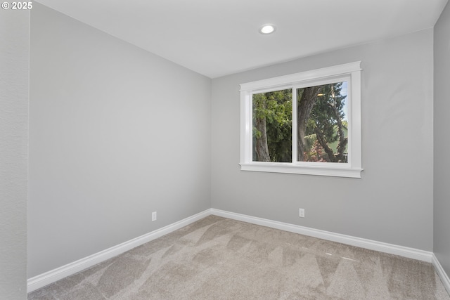 3817 NE 11th Ave, Portland, OR 97212 - carpeted spare room featuring baseboards and recessed lighting