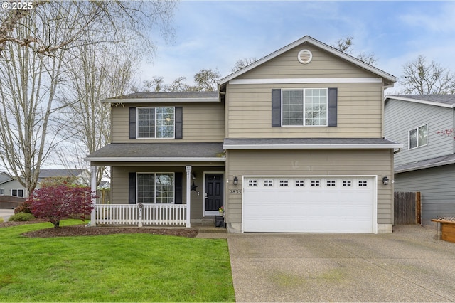 traditional home with a front yard, a porch, a garage, concrete driveway, and roof with shingles
