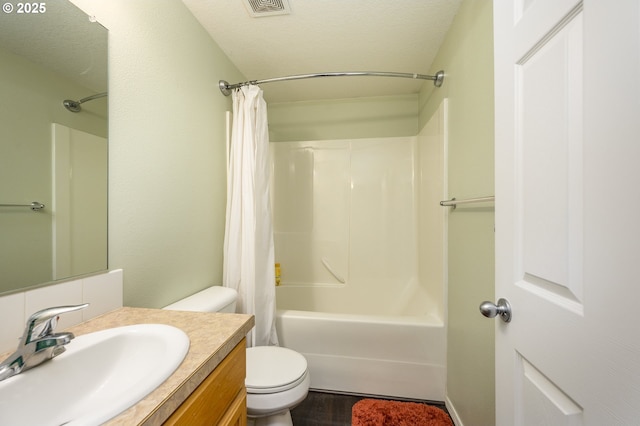 full bath with vanity, toilet, visible vents, shower / bath combo with shower curtain, and wood finished floors