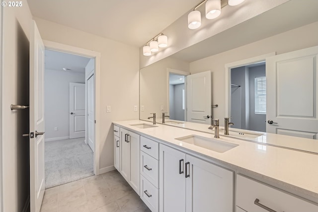 12935 SW Tabor Ter, Beaverton, OR 97007 - full bath with double vanity and tile patterned flooring