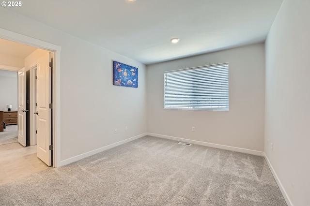 12935 SW Tabor Ter, Beaverton, OR 97007 - unfurnished room with light carpet and recessed lighting