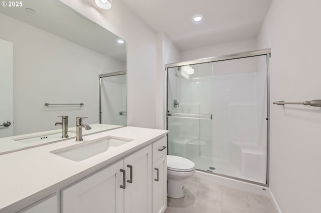 12935 SW Tabor Ter, Beaverton, OR 97007 - bathroom with a shower stall, vanity, recessed lighting, and marble look tile flooring