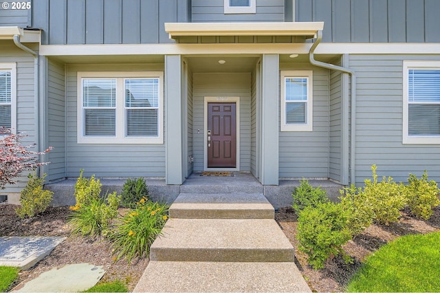 12935 SW Tabor Ter, Beaverton, OR 97007 - doorway to property featuring board and batten siding