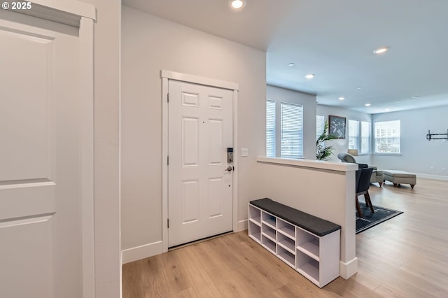 12935 SW Tabor Ter, Beaverton, OR 97007 - foyer with light wood finished floors and recessed lighting