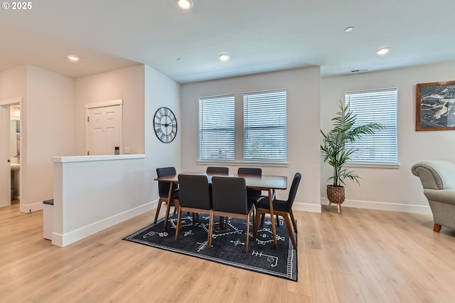 12935 SW Tabor Ter, Beaverton, OR 97007 - dining space featuring wood finished floors and recessed lighting
