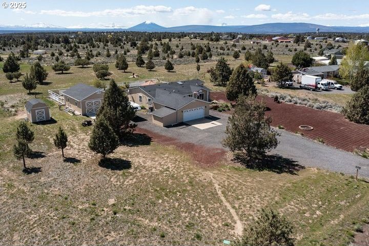 6577 SW Shad Rd, Terrebonne, OR 97760 - drone / aerial view featuring a mountain view and a rural view
