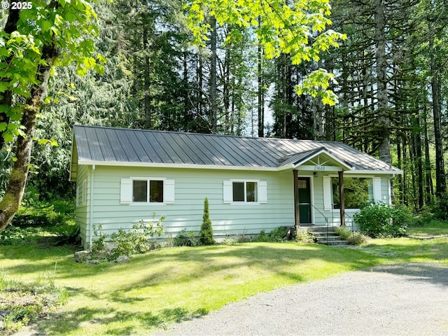 23610 E Gumjuwac Rd, Brightwood, OR 97011 - single story home with metal roof, a front yard, and a standing seam roof