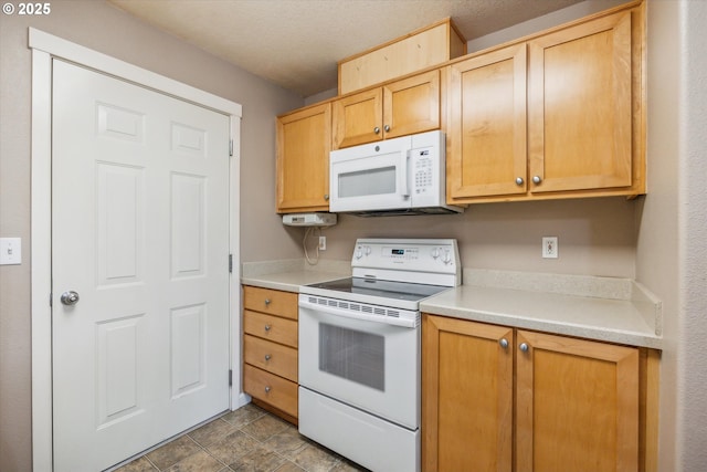 14781 SW Beard Rd, Beaverton, OR 97007 - kitchen featuring white appliances, light countertops, and light brown cabinetry