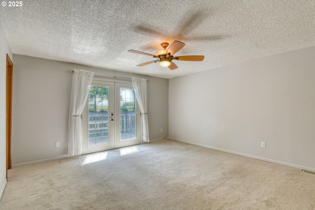 458 NW 21st St, Pendleton, OR 97801 - carpeted spare room featuring french doors, a ceiling fan, and a textured ceiling