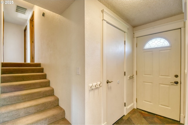 458 NW 21st St, Pendleton, OR 97801 - foyer entrance with stairway and a textured ceiling