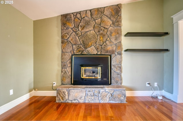 458 NW 21st St, Pendleton, OR 97801 - detailed view of wood finished floors and a stone fireplace