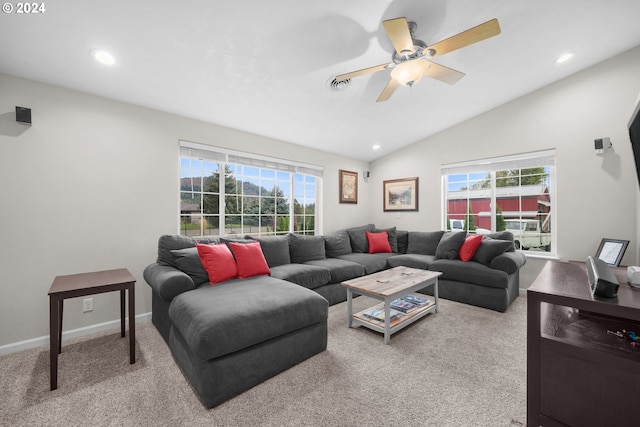 living area with lofted ceiling, recessed lighting, light colored carpet, visible vents, and baseboards