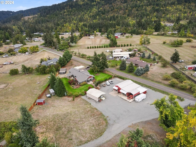 bird's eye view featuring a view of trees