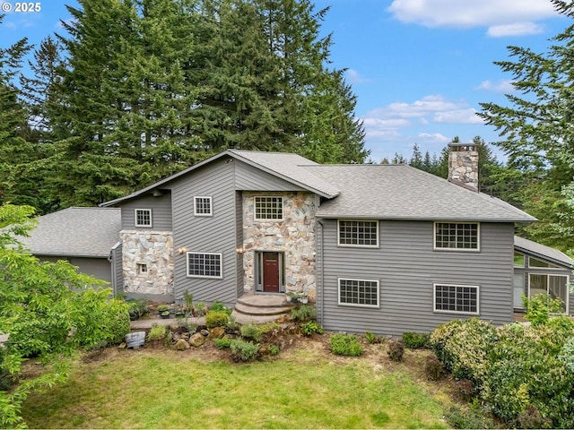 21075 NE Turner Ln, Hillsboro, OR 97123 - mid-century home with stone siding, a chimney, a shingled roof, and a front yard