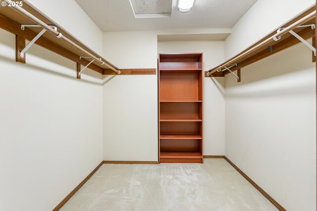 21075 NE Turner Ln, Hillsboro, OR 97123 - unfurnished bedroom with multiple windows, light carpet, a closet, baseboards, and a textured ceiling