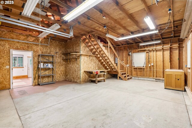 21075 NE Turner Ln, Hillsboro, OR 97123 - spare room with track lighting, baseboards, and a ceiling fan