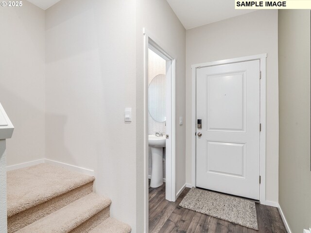 bathroom featuring toilet and sink