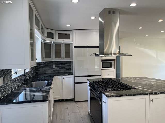 3345 SW 124th Ave, Beaverton, OR 97005 - kitchen with island range hood, white appliances, decorative backsplash, dark stone counters, and recessed lighting