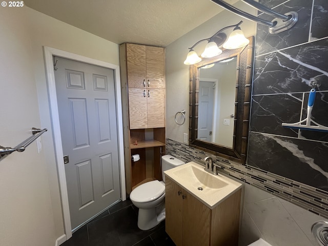 3345 SW 124th Ave, Beaverton, OR 97005 - half bath featuring vanity, tile patterned floors, and backsplash