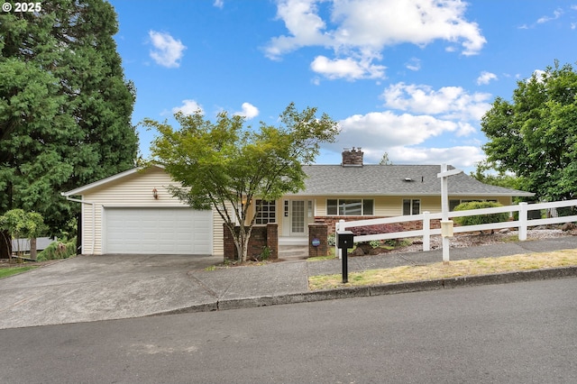 3025 SW Wallula Ave, Gresham, OR 97080 - ranch-style house with a garage, concrete driveway, a chimney, and a shingled roof