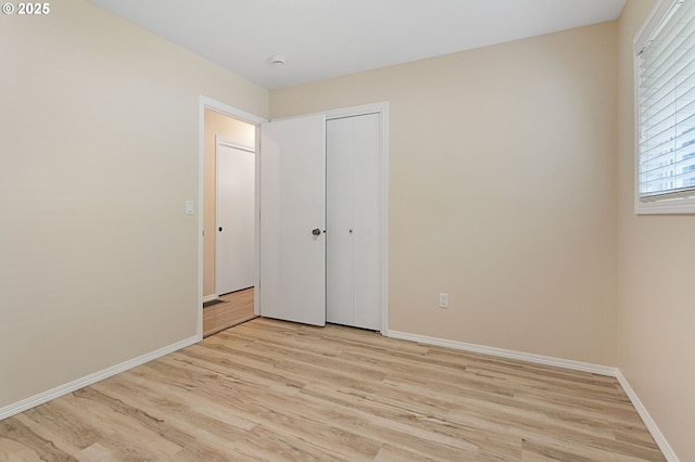 3025 SW Wallula Ave, Gresham, OR 97080 - unfurnished bedroom featuring light wood-style flooring and a closet