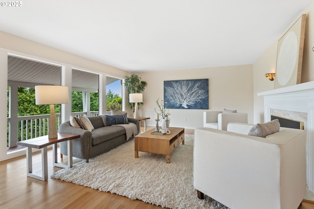 3025 SW Wallula Ave, Gresham, OR 97080 - living area with wood finished floors and a premium fireplace