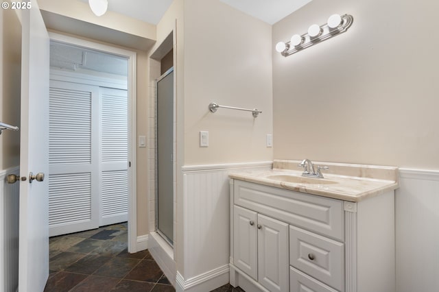 3025 SW Wallula Ave, Gresham, OR 97080 - bathroom with wainscoting, a stall shower, and vanity