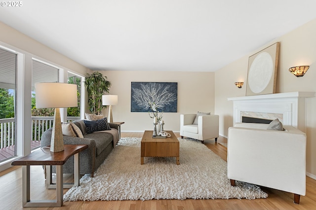 3025 SW Wallula Ave, Gresham, OR 97080 - living area with wood finished floors and a premium fireplace