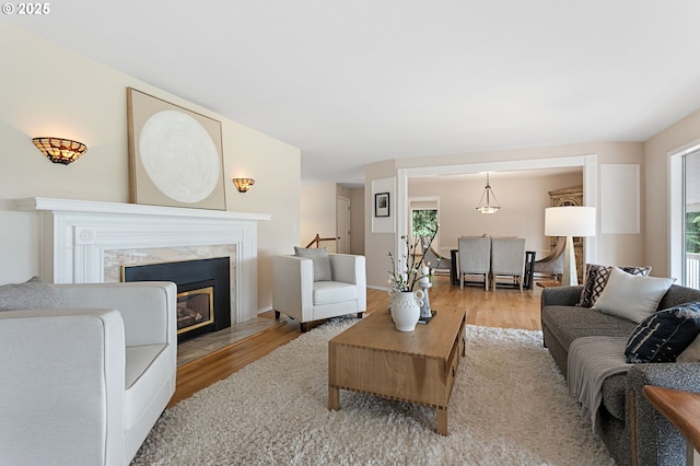3025 SW Wallula Ave, Gresham, OR 97080 - living area featuring wood finished floors and a premium fireplace