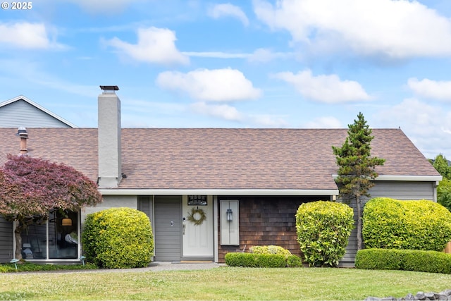 13355 SW Chimney Ridge Ct, Tigard, OR 97223 - view of front of house featuring roof with shingles, a front lawn, and a chimney