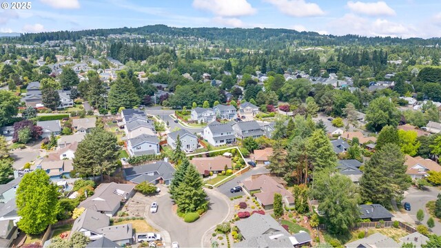 13355 SW Chimney Ridge Ct, Tigard, OR 97223 - aerial perspective of suburban area featuring a heavily wooded area