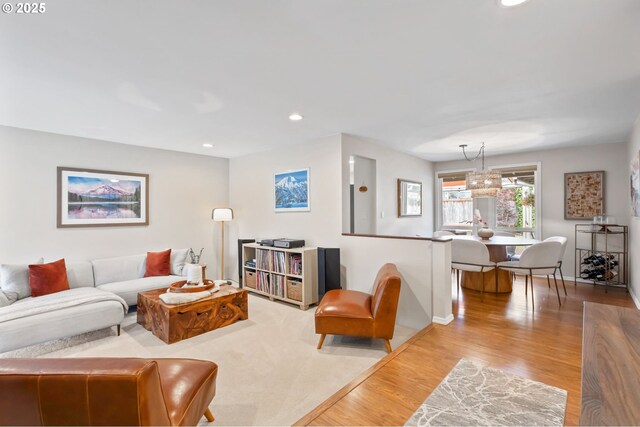 13355 SW Chimney Ridge Ct, Tigard, OR 97223 - living area featuring wood finished floors, recessed lighting, and a chandelier