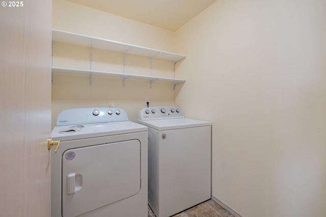 laundry area with laundry area and washing machine and dryer