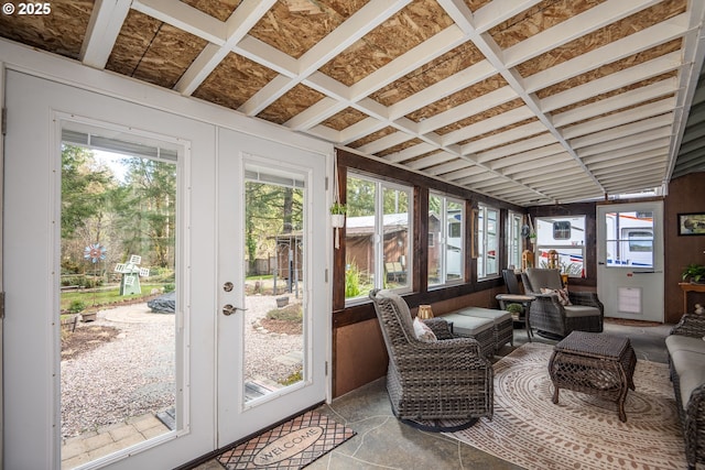 sunroom / solarium with a wealth of natural light and french doors