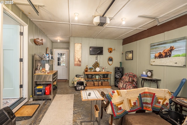 interior space with a garage and concrete flooring