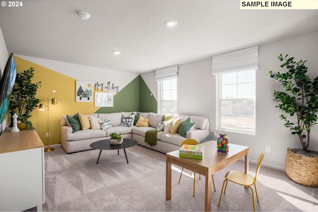 4321 Dogwood Ave, Albany, OR 97322 - living area featuring light colored carpet, a textured ceiling, baseboards, and recessed lighting
