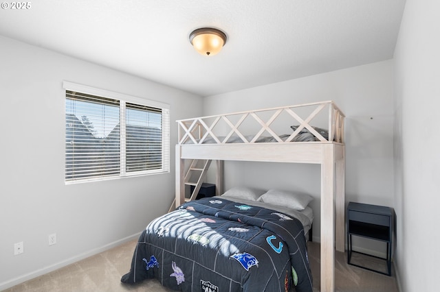 bedroom featuring carpet flooring