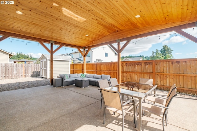 5300 Davis St SE, Turner, OR 97392 - fenced backyard with a patio, an outdoor hangout area, a storage unit, and outdoor dining area